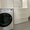 Meuble lave linge à gauche plan résine